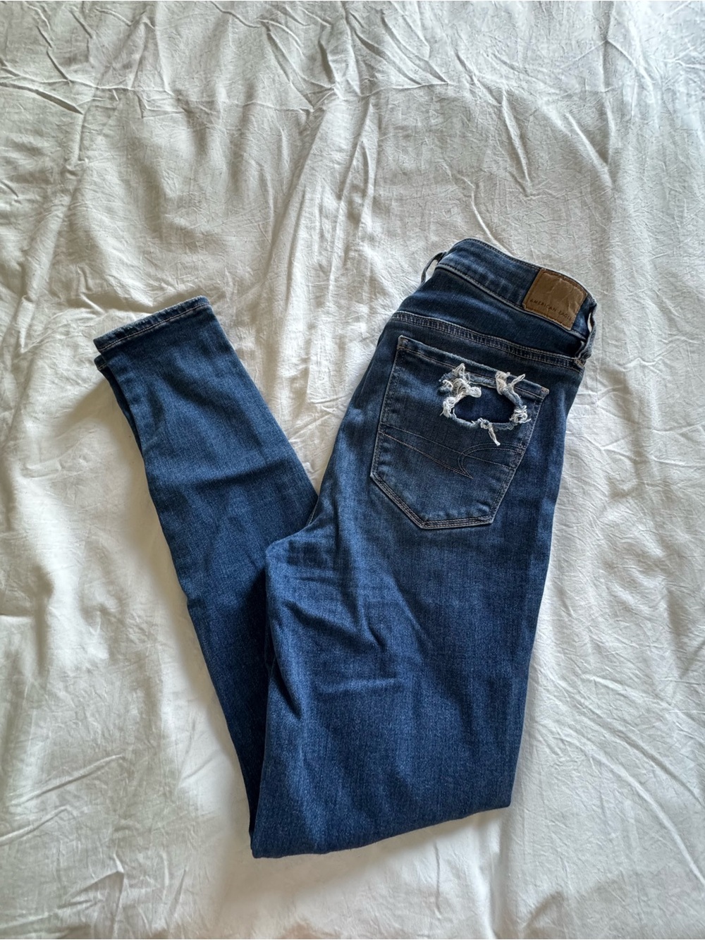 American Eagle Outfitters Dark Blue Skinny Jeans with Distressed Back Pocket